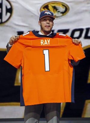 The Denver Broncos picked Shane Ray with the 23rd pick of the NFL Draft in Chicago on Thursday night.