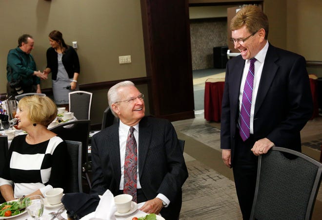 Springfield mayor Mike Houston, left, laughs with mayor-elect Jim Langfelder before the State of the City address at the Prairie Capital Convention Center Thursday, April 30, 2015. Langfelder will be sworn into office next week. Ted Schurter/The State Journal-Register