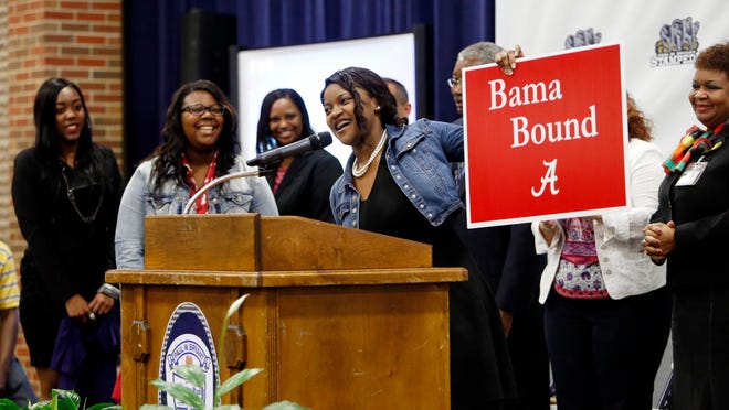 Cierra Pugh announces her plan to attend the University of Alabama during the Paul W. Bryant High School College and Career Commitment Ceremony on Thursday. Ninety-seven percent of the 206 students in the senior class at Bryant have plans to either attend college, take an internship, join the military or a get job after graduation in May.