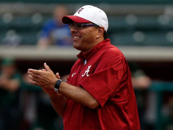 Alabama 
softball coach Patrick Murphy celebrates Carrigan Fain’s home run against UAB in Tuscaloosa, on April 14. The Crimson Tide plays at Arkansas this weekend in a three-game series.