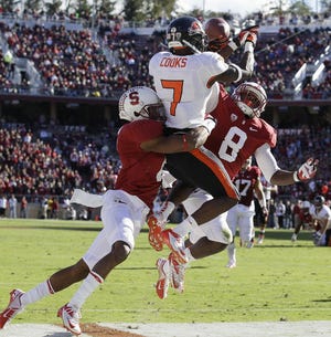 Stanford safety Jordan Richards (8) break up a pass intended for Oregon State wide receiver Brandin Cooks (7) in 2012. The Patriots picked Richards with the 32nd pick of the 2nd round of the 2015 NFL Draft on Friday. Jeff Chiu/THE ASSOCIATED PRESS