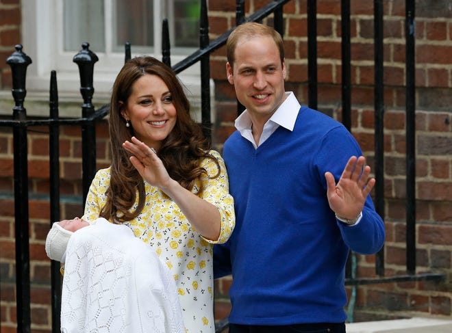 Britain's Prince William and Kate, Duchess of Cambridge and their newborn baby princess, pose for the media as they leave St. Mary's Hospital's exclusive Lindo Wing, London, Saturday, May 2, 2015. Kate, the Duchess of Cambridge, gave birth to a baby girl on Saturday morning.  (AP Photo/Kirsty Wigglesworth)