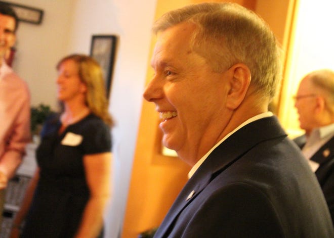 Fergus and Jenny Cullen hosted a traditional New Hampshire house party for Republican South Carolina Senator Lindsey Graham, a potential 2016 presidential candidate, at their home in Dover on Saturday evening. (Crystal A. Weyers photo)