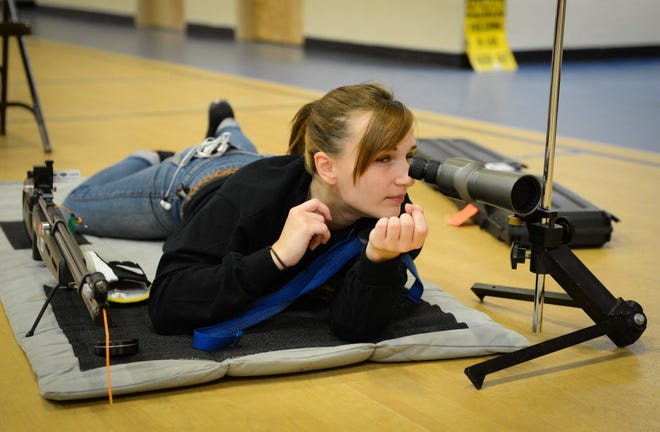 Kayla Gentile, 16, of Sarasota Military Academy, gets ready to compete in the 2015 Florida State Junior Olympics Three Position Air Rifle competition Saturday, May 2 at Sarasota Military Academy.