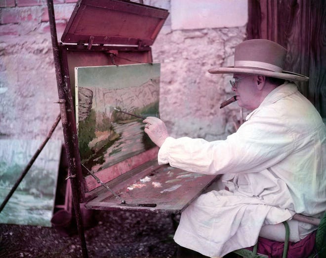 Photo by Frank Scherschel/The LIFE Picture Collection/Getty Images British statesman Winston Churchill painting a view of the Sorgue River while on vacation.