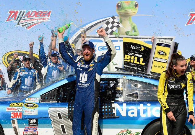 Dale Earnhardt Jr. celebrates in Victory Lane after winning the Talladega 500 NASCAR Sprint Cup Series auto race at Talladega Superspeedway, Sunday, May 3, 2015, in Talladega, Ala.