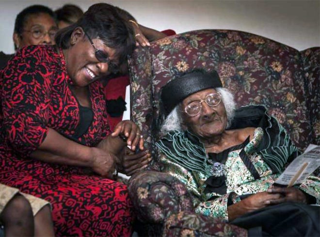 Shirley Thomas (left) shared a moment with her mother, Blanche Cobb, in advance of her mother's 114th birthday.