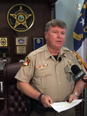 Sheriff Hans Miller speaks to press during a Monday morning press conference.