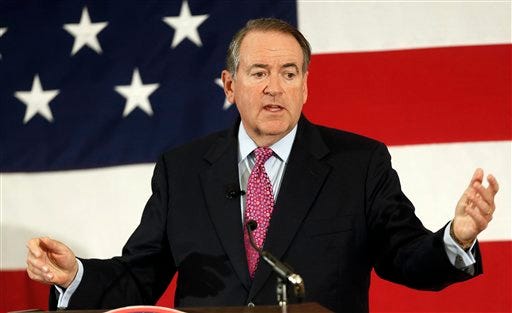 In this April 18, 2015 file photo, former Arkansas Republican Gov. Mike Huckabee speaks at the Republican Leadership Summit in Nashua, N.H. Huckabee is set to announce he will seek the 2016 Republican presidential nomination. He has an event planned for May 5 in his hometown of Hope, Ark., where former President Bill Clinton was also born. (AP Photo/Jim Cole, File)