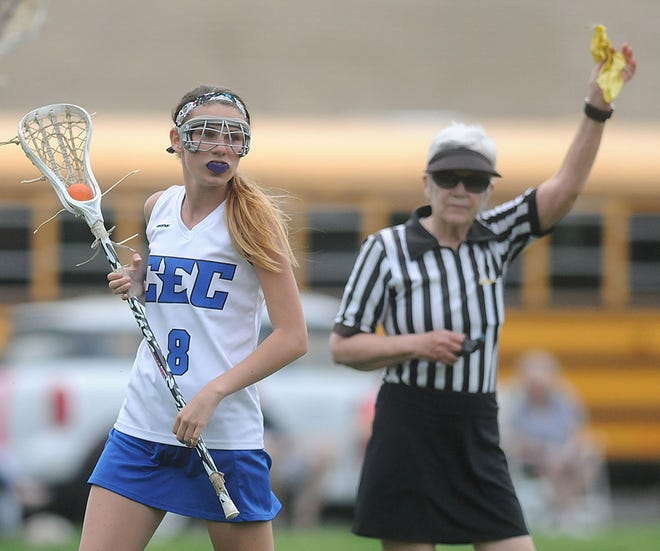 Conwell-Egan's Brianna Kay (8) gets a yellow flag during a game against John W. Hallahan on Tuesday, May 4, 2015. CEC lost 12-11.