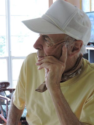 Maurice Metrogen thinking of his next painting or next tennis game.