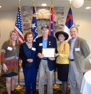 Pictured at the military service awards bestowal service are, from left: Kim Jordan Weir, niece; Margaret Barkley Ellis, wife; Clyde Joseph (Joe) Ellis; Linda H. Aschbrenner (niece); and Don Aschbrenner.