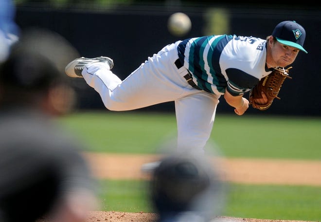 UNCW pitcher Ryan Foster throws against Delaware at Brooks Field in Wilmington on Saturday.