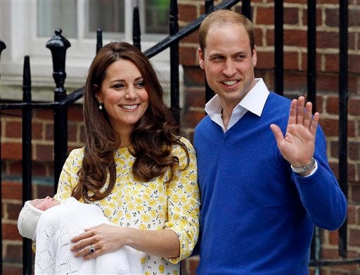 In this Saturday, May 2, 2015. file photo, Kate Duchess of Cambridge and Prince William smile as they carry their newborn baby princess from The Lindo Wing of St. Mary's Hospital, in London Britain's newborn princess has been named Charlotte Elizabeth Diana it was announced on Monday May 4. (AP Photo/Kirsty Wigglesworth, File)