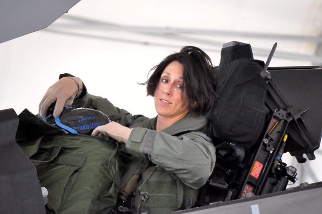 Lt. Col. Christine Mau takes a moment to relax after her first flight in an F-35A.