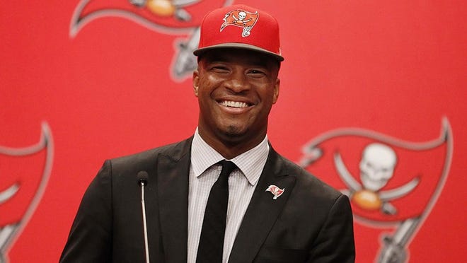 May 1, 2015; Tampa, FL, USA; Tampa Bay Buccaneers quarterback Jameis Winston (3) is introduced at a press conference at One Buc Place the day after being selected as the number one overall pick in the 2015 NFL Draft. Mandatory Credit: Kim Klement-USA TODAY Sports