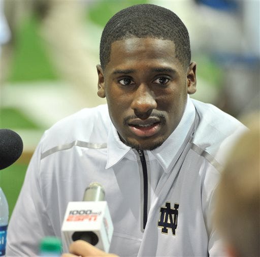 Notre Dame quarterback Everett Golson answers a question during media day for the NCAA college football team in South Bend, Ind. Golson has announced he is leaving Notre Dame and will use his final season of eligibility elsewhere after graduating later this month.