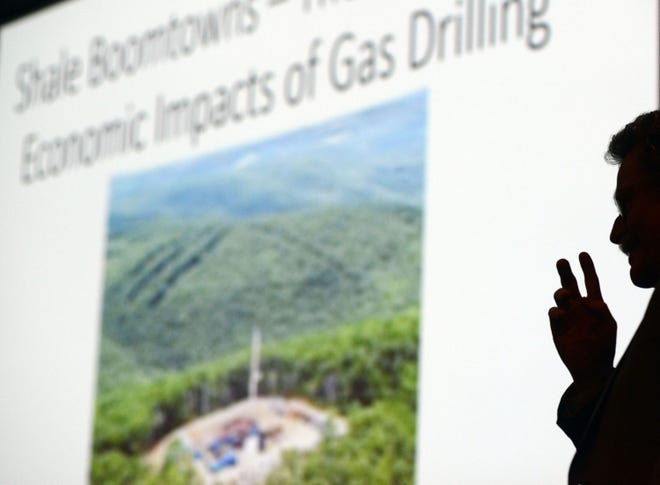 Stephen Herzenberg, executive director of the Keystone Research Center, is silhouetted as he speaks Thursday, May 7, during a forum entitled Shale Boomtowns: The Economic and Social Impacts at the Bucks County Visitor Center in Bensalem, Pennsylvania.