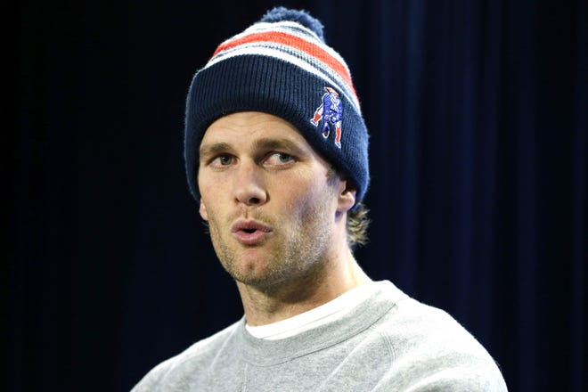 New England Patriots quarterback Tom Brady speaks at a news conference in Foxborough, Mass., Thursday, Jan. 22, 2015. Brady addressed the issue of the NFL investigation of deflated footballs. Brady was suspended four games by the NFL in May.