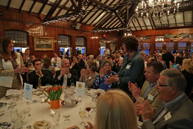Attendees at a Wolf School fundraiser, "Discover the Difference," held at The Squantum Club, in East Providence, on Thursday, April 30.

Photo by Tim Marshall