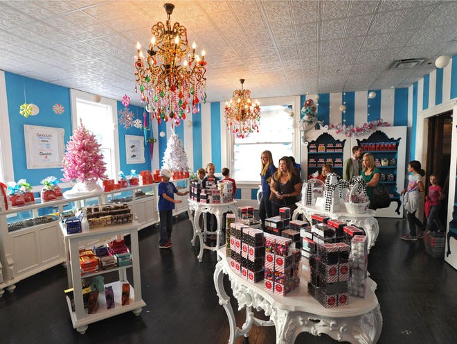Students and parents from a Baker County home school group toured Sweet Pete's. On Tuesday Dec. 2, 2014 media and downtown representatives were given a sneak peek of The Candy Apple Cafe & Cocktails, the restaurant opening in new the Sweet Pete's building on Hogan Street in Downtown Jacksonville, FL. Sweet Pete's was also hosting school tour groups in advance of their opening in the next few weeks.