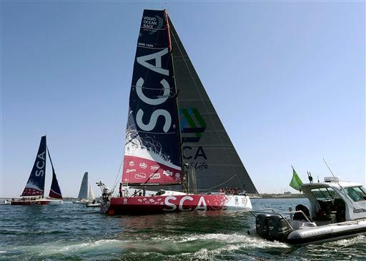FILE - In this May 7, 2015 file photo, the SCA racing yacht, center, competing in the international Volvo Ocean Race, arrives in Newport Harbor in Newport, R.I. The SCA boat is the only one in the race with an all-female crew. The second SCA yacht, behind left, is a training boat that sailed to greet the racing yacht. Newport, once home to the Americaís Cup, has a rich sailing history and is making strides to reaffirm its position as an international sailing mecca by hosting the only North American stopover of the Volvo race, a nine-month, 10-port circumnavigation. (AP Photo/Steven Senne)
