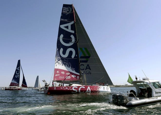 The SCA racing yacht, center, competing in the international Volvo Ocean Race arrives at Newport Harbor in Newport, R.I., on Thursday. The SCA boat is the only one in the race with an all-female crew. The second SCA yacht, behind left, is a training boat that sailed to greet the racing yacht. Newport, once home to the America's Cup, has a rich sailing history and is making strides to reaffirm its position as an international sailing mecca by hosting the only North American stopover of the Volvo race, a nine-month, 10-port circumnavigation.