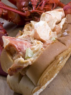 Get your office pals together and send in an order for lobster rolls to be delivered for Friday lunch. It's a church fundraiser and a great deal.

AP Photo