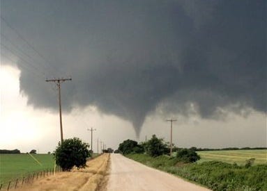 In this Saturday, May 9, 2015 photo provided by Brian Khoury, a tornado touches down in Cisco, Texas. One person was killed Saturday night and another left in critical condition after the tornado hit Cisco, a rural farming and ranch area about 100 miles west of Fort Worth. (Brian Khoury via AP)