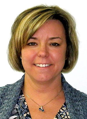 Kathy Burger has been named township manager in Medford.