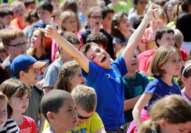 Students at Lincoln Street and Main Street Schools in Exeter get pumped-up during a Get Fit in May 5K Pep Rally on Friday. Photo by Rich Beauchesne/Seacoastonline