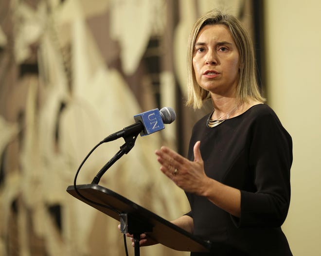 Federica Mogherini, the high representative of the European Union for foreign affairs, speaks to reporters after a security council meeting at United Nations headquarters, Monday, May 11, 2015. The European Union's top diplomat has assured the U.N. Security Council that under a proposed EU maritime operation against the growing wave of migrant smuggling, "no refugee or migrant intercepted at sea will be sent back against their will." (AP Photo/Seth Wenig)