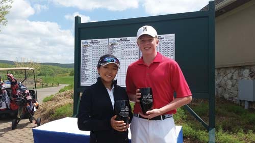 Photo by Andrew Tredinnick/New Jersey Herald — Rina Jung, left, and Bear Carlson were the girls and boys champions, respectively, in the 15-18 age group for the IMG Junior Golf Northeast Tour Championship at Ballyowen Golf Club.