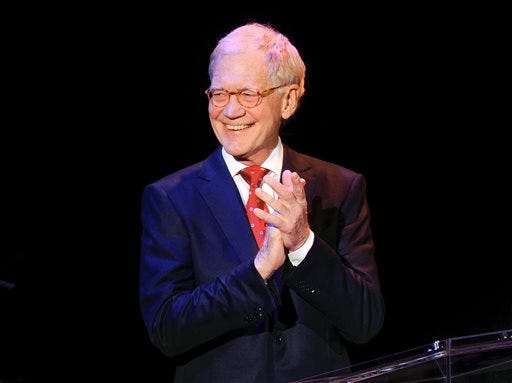 In this March 2, 2015 file photo, David Letterman attends "An Evening of SeriousFun Celebrating the Legacy of Paul Newman", hosted by the SeriousFun Children's Network at Avery Fisher Hall in New York. After 33 years hosting late night talk shows, Letterman will retire on May 20. (Photo by Evan Agostini/Invision/AP, File)