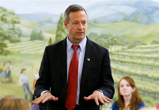 In this April 9, 2015 file photo, former Maryland Gov. Martin O'Malley speaks in Indianola, Iowa. O'Malley often casts his adopted hometown of Baltimore as the comeback city, a community that overcame the ravages of drugs and violence after he was swept into the mayor's office. Now weeks before the former Maryland governor expects to launch his presidential campaign _ and challenge Hillary Rodham Clinton in the Democratic primaries _ Baltimore's turnaround has been marred by rioting and unrest after the police-custody death of Freddie Gray. The turmoil has placed new scrutiny on O'Malley's tough-on-crime "zero tolerance" policies as mayor beginning in 1999. (AP Photo/Charlie Neibergall, File)