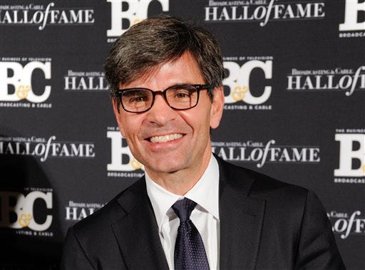 This Oct. 20, 2014 file photo shows George Stephanopoulos at the 24th Annual Broadcasting and Cable Hall of Fame Awards in New York. Stephanopoulos has apologized for not notifying his employer and viewers about two contributions totaling $50,000 that he made to the Clinton Foundation. ABC's news division said Thursday, May 15, 2015, that "we stand behind him." The donations, made in two installments in 2013 and 2014 and first reported in Politico, were made because of Stephanopoulos' interest in the foundation's work on global AIDS prevention and deforestation, he said. (Photo by Evan Agostini/Invision/AP, File)
