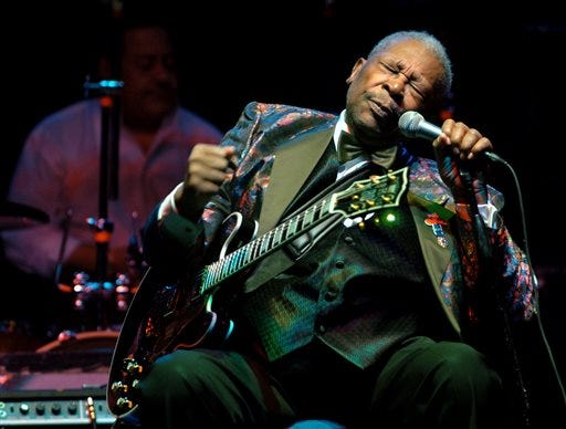 In this Feb. 16, 2007 file photo, B.B. King performs at the Wicomico Youth and Civic Center, in Salisbury, Md. King died Thursday, May 14, 2015, peacefully in his sleep at his Las Vegas home at age 89, his lawyer said. (Matthew S. Gunby/The Daily Times via AP)
