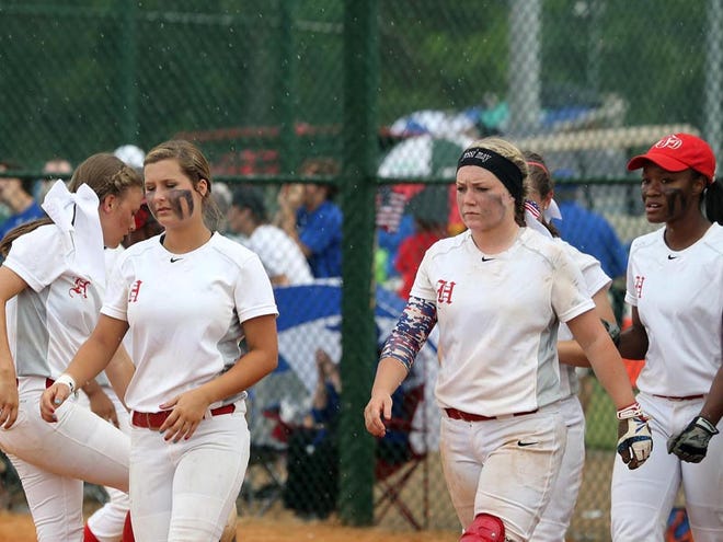 The Hillcrest Patriots walk to third base after losing to Chelsea during a Class 6A game in the AHSAA State Tournament at Lagoon Park Softball Complex in Montgomery, Ala. on Friday May 15, 2015.  staff photo | Erin Nelson