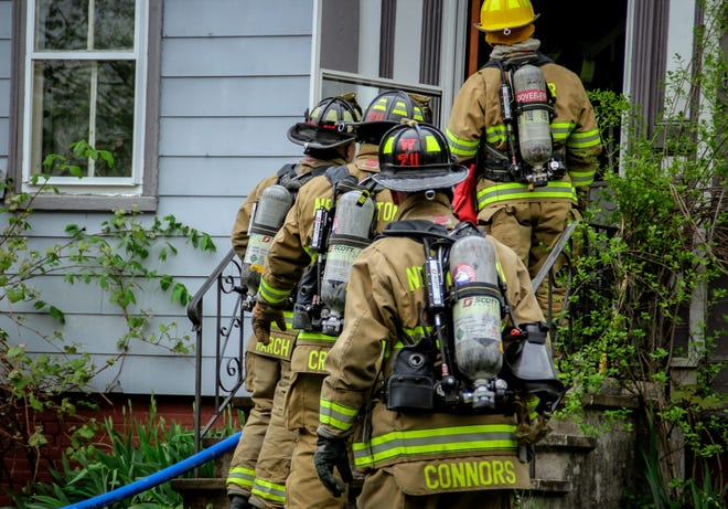 Firefighters battled a two-alarm fire in an apartment building at 92 Cocheco St. in Dover early Saturday afternoon. Photo by Shawn St.Hilaire/fosters.com