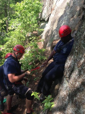 (Photo by Gastonia Fire Department) Rescue workers were at Crowders Mountain State Park attempting a rescue Saturday, May 16, 2015, after a woman fell about 150 feet. The woman ended up dying on the mountain.