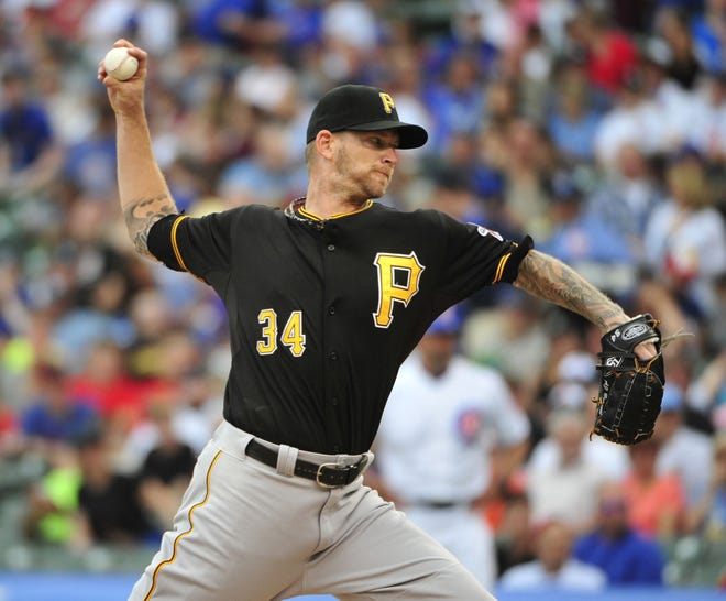 Pirates pitcher A.J. Burnett throws against the Cubs during the first inning on Sunday in Chicago.