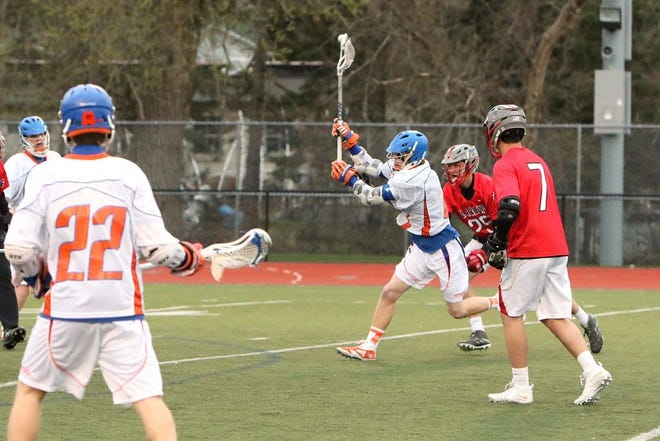 Mustang's # 2 Sean Emerson, shown in an earlier game, led Penn Yan's scoring against Albany Academy.