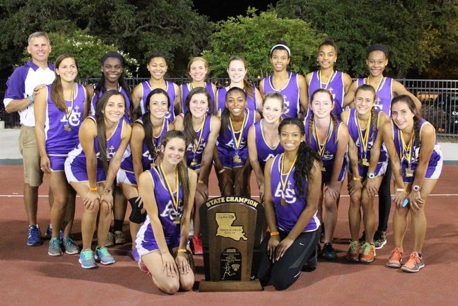 The Ascension Catholic girl's track team celebrates their first ever track championship.
