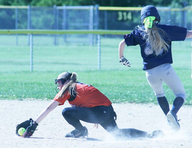 Kewanee’s Mackenzie Mirocha stretches for the throw as A-W’s Charlotte Pillen arrives safely standing up at second base.
