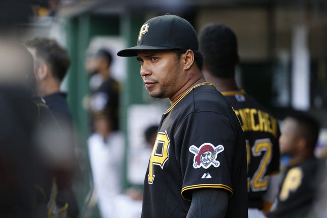 Pittsburgh Pirates Jose Tabata stands in the dugout during a baseball game against the Minnesota Twins in Pittsburgh on Tuesday.