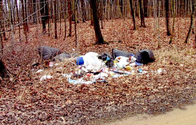 Part of Church Road has been plagued by all manner of trash for months. COURTESY PHOTO