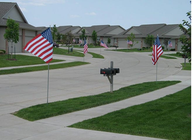 An example of an Avenue of Flags sponsored by an Optimist Club. Contributed