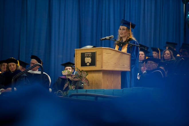 Student speaker Alexandria Flor talks to her class during the graduation ceremony for Bucks County Community College's Class of 2015 on Thursday, May 21, 2015. The school graduated a class of about 1,000 students this year.