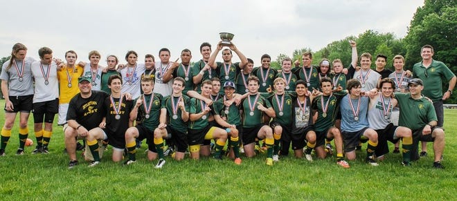 The Doylestown high school boys rugby team won the RugbyPA state championship. Team members include (front row, from left) assistant coach Mark Weir, Dominic DeFonso, Kevin Reilly, Brian Stella, Ashton McGovern, Sam Devine, Mike Weir, Billy Stermel, Lance Hendrie, Luis Zamora, Vince Iacobone, Grant Eden, Jake Smith and assistant coach Bob Cassidy. In the second row are Malcolm Price, Angelo Vitantonio, Jack Armogast, Alex Armogast, Angus Price, Matt Tur, Dylan Pfaff, Ryan McElhattan, Ryheem Powell, Hunter Smith, captain Angel Santiago, Tom Capriotti, Aubrey Mabone, Tom Koch, Ryan Cornell, Roman Boell, Kenny Rickards, Conor Ellis, Rasul Arymbaev, Vince Johnston and assistant coach Kevin Reilly. Tom McCoy and head coach Mike McCandless are missing from the photo.