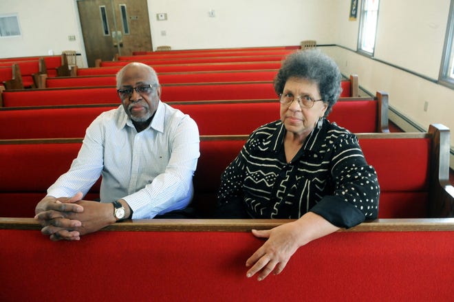 Kel Edwards and Valerie Cunningham, sit at the New Hope Baptist Church where an overnight vigil will take place showing 9 coffins followed by the official opening of the African Burying Ground Memorial Park. The coffins contain the remains of the cityþÄôs earliest African-American residents, both free and slave, discovered during infrastructure improvement work on Chestnut Street in October 2003.

Deb Cram/Seacoastonline